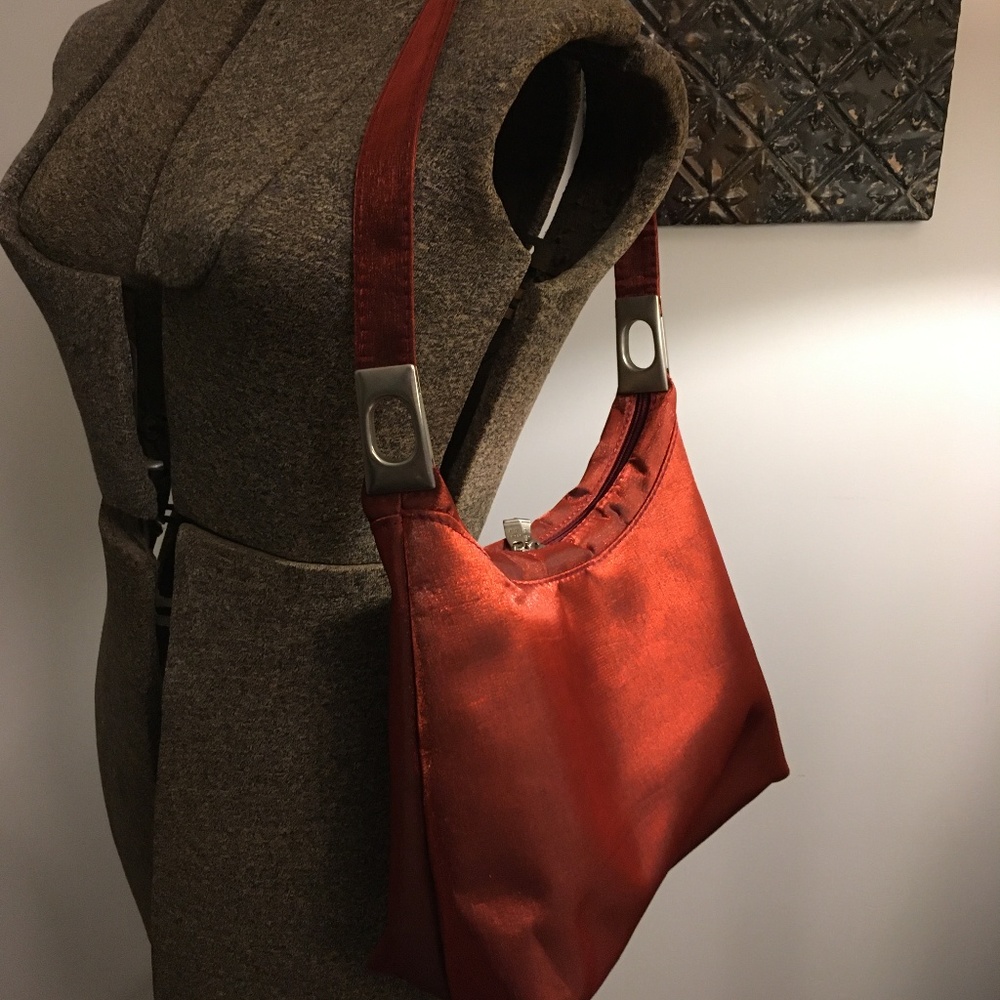 Red iridescent Designed in Italy shoulder handbag